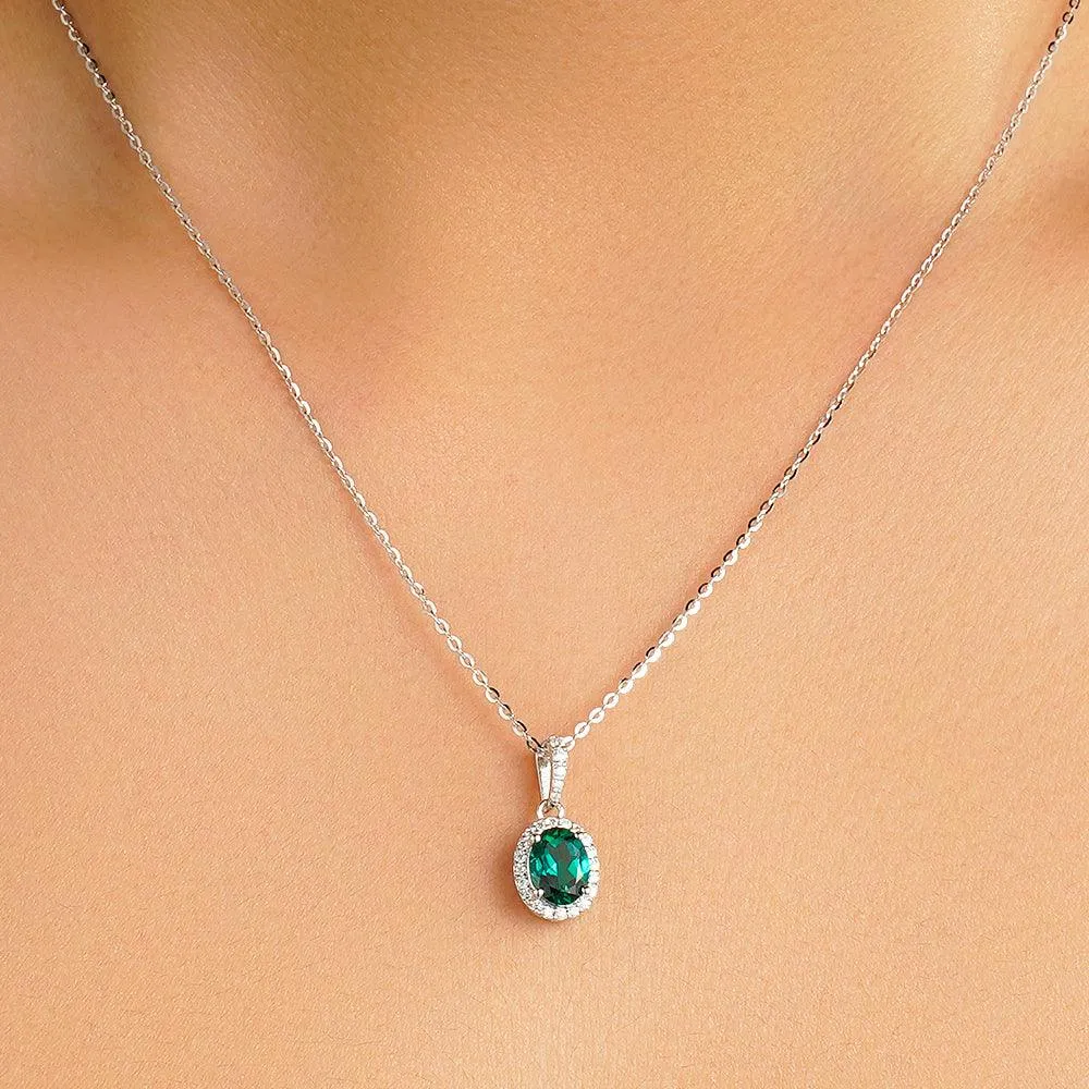 1.69 CT. Vintage Style Oval Emerald Halo Pendant