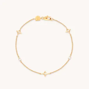 Cosmic Star Charm Bracelet in Gold