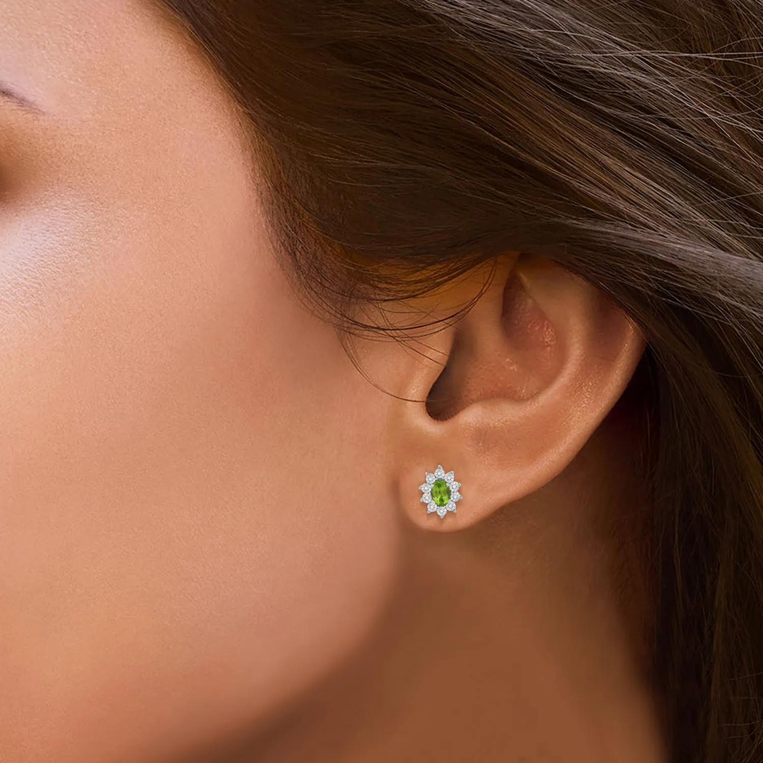 Jewelili Sterling Sliver 6x4 MM Oval Genuine Peridot and 1/20 Cttw Natural White Round Diamond Cluster Stud Earrings